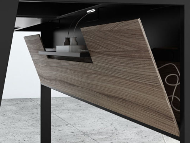 The Sigma 6903 compact laptop desk includes a power strip and cable management ledge, keeping wires and cables concealed behind east access panels that can tilt down for easy access to connections.